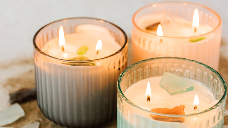 The Scented Market Beach Glass Soy Candle Collection. Driftwood (Black), Coral (Pink) and Sand Dunes (Green).