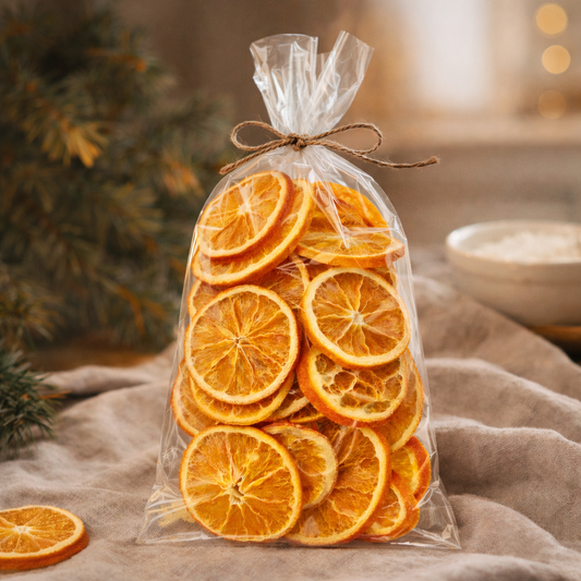 Bag of dried orange slices tied with a string on a textured surface with a blurred background